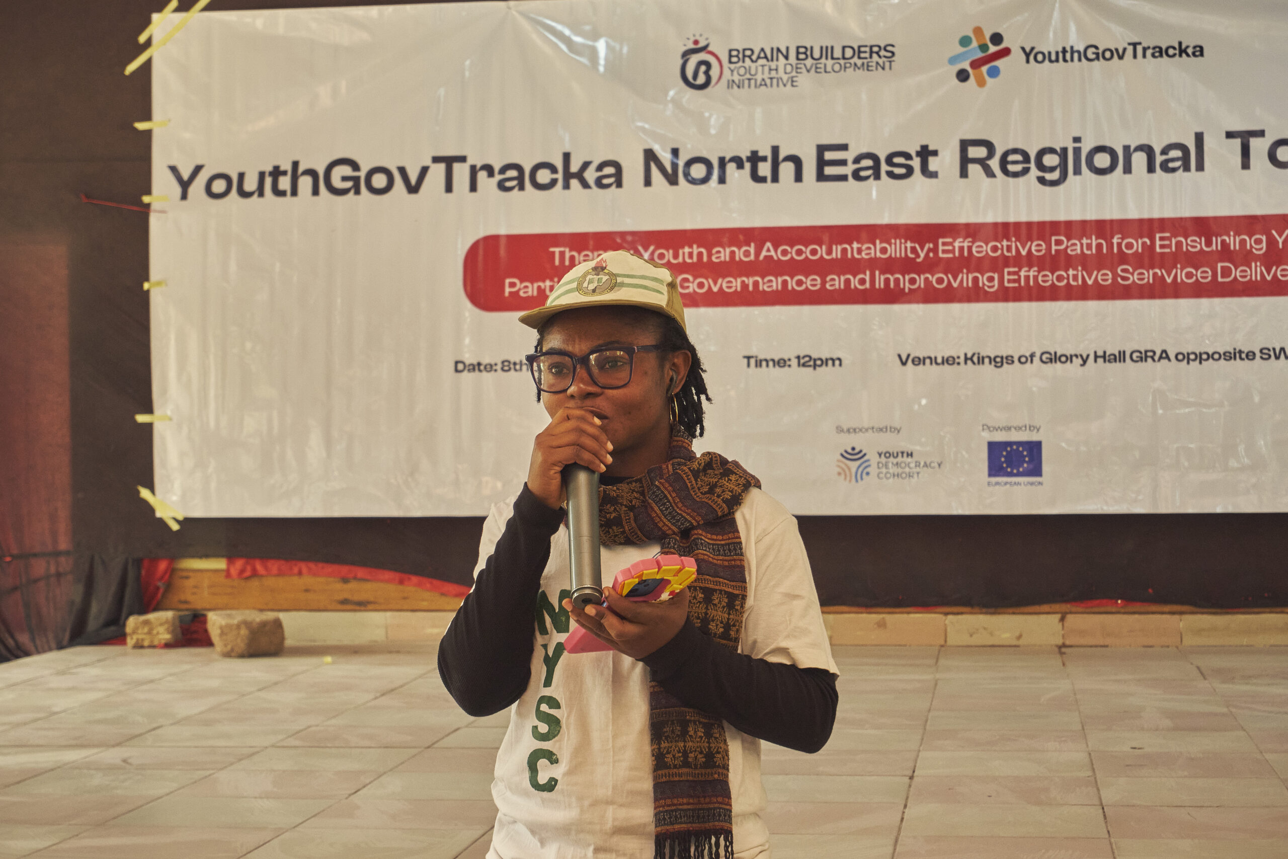 A youth corper in a townhall meeting